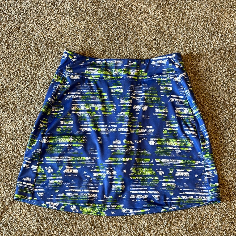 Callaway Skort Size Small in EUC. The colors are periwinkle lime Green and white